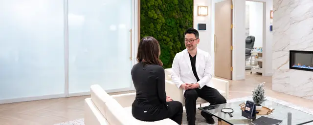 Dr. Guo in a consultation with a patient