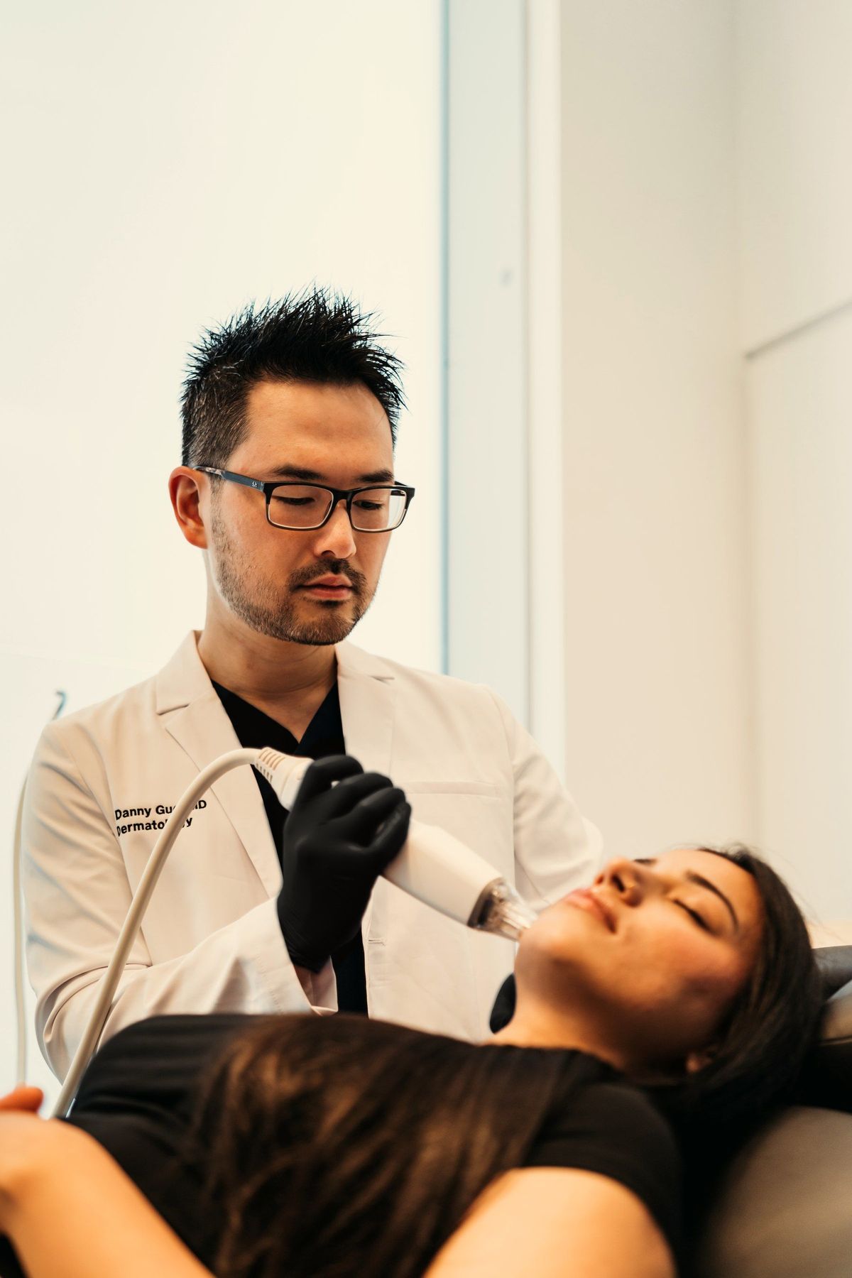 Dr. Guo performing a laser treatment